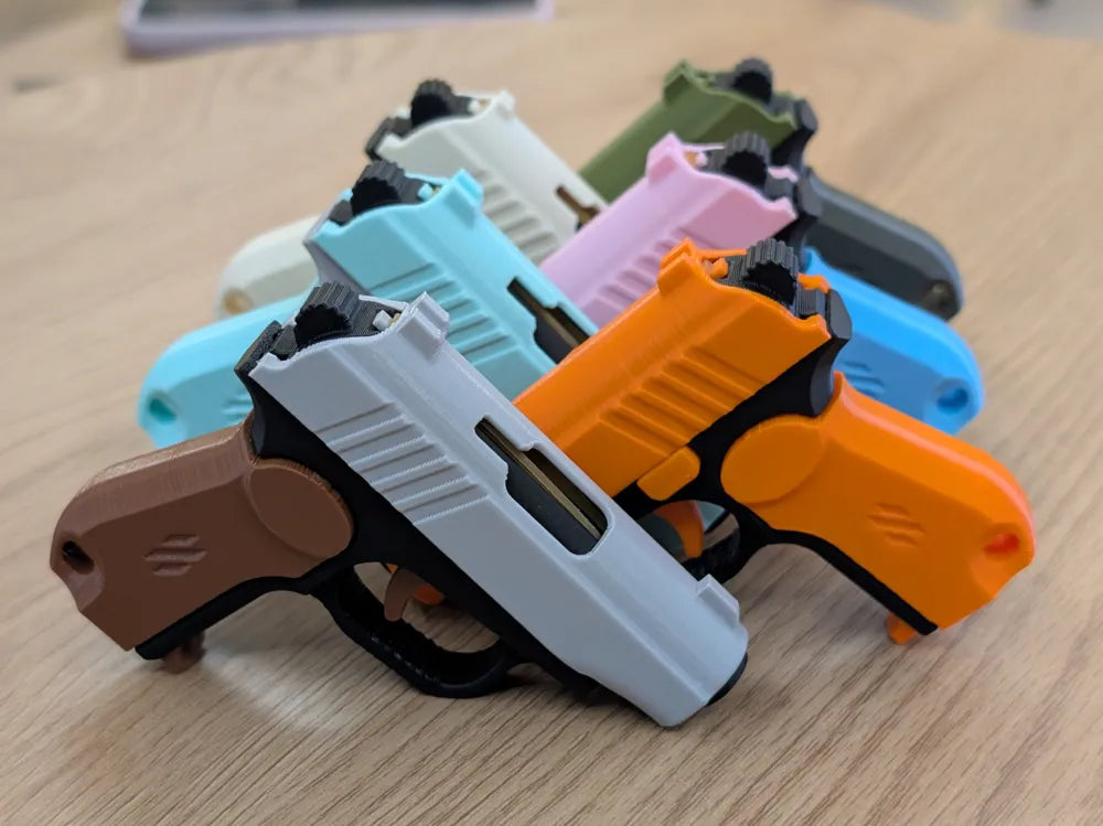 Gun Fidget Keychain – Pocket Slide Action Toy