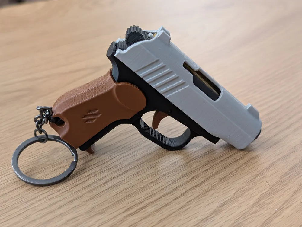 Gun Fidget Keychain – Pocket Slide Action Toy
