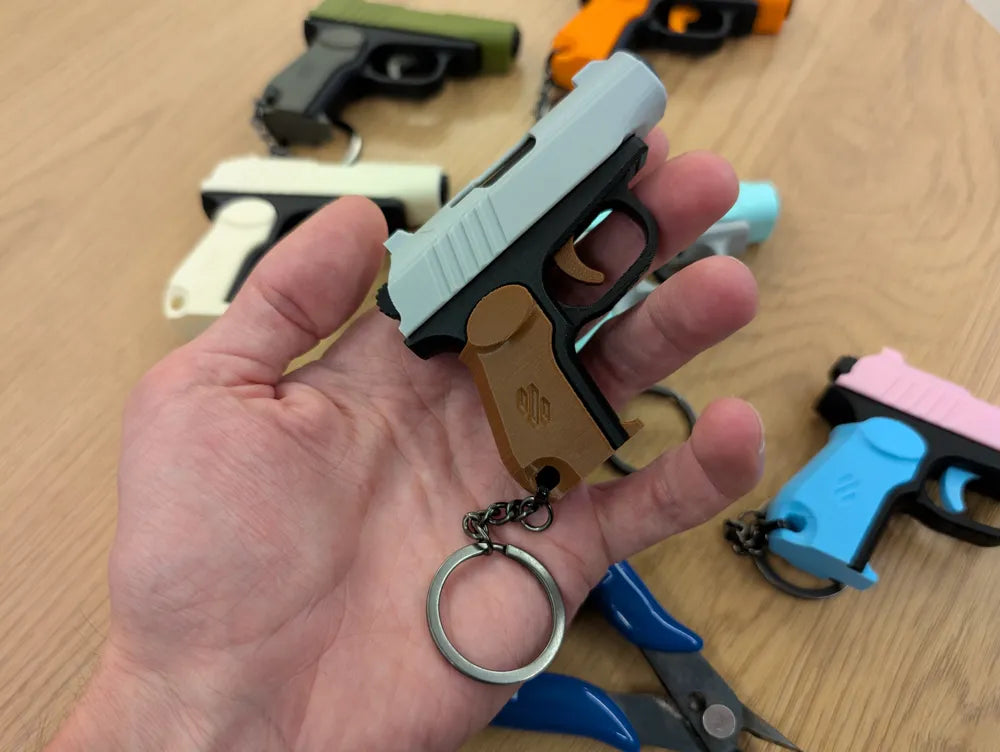 Gun Fidget Keychain – Pocket Slide Action Toy