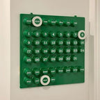 Minimal 3D printed sliding calendar magnet on fridge